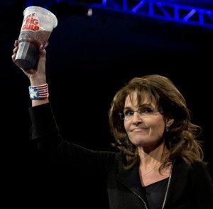 This perfectly framedAP file photo from March 16 shows Palin's eager embrace of red-meat politics that seeks to prevent small measures to address the proliferation of obesity in the United States. 